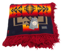 Load image into Gallery viewer, Pendleton Chief Joseph Blanket in indigo, featuring a traditional Native American-inspired geometric pattern with arrow motifs, folded neatly to show intricate design and soft wool texture. Front View