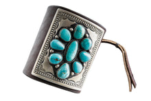 Load image into Gallery viewer, Dark brown leather bow guard with nine turquoise stones on a silver plate with stamp work on a white background
