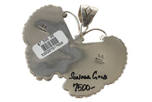 Load image into Gallery viewer, Back of a silver pendant with Lee Charley hallmark engraving on a white background