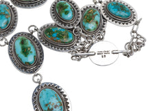 Load image into Gallery viewer, Native American Silver necklace with turquoise stones on a light gray background