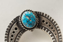 Load image into Gallery viewer, Sonaron Gold turquoise stone on a Silver u-shaped jewelry pieceon a light gray background