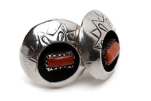 Load image into Gallery viewer, Pair of vintage Native American circular silver and coral shadow box earrings leaning against each other on a white background