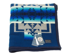 Load image into Gallery viewer, Pendleton Chief Joseph Blanket in Aegean featuring a traditional Native American-inspired geometric pattern with arrow motifs, folded neatly to show intricate design and soft wool texture. front View