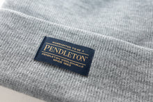 Load image into Gallery viewer, Close up of the Pendleton tag on a grey classic beanie