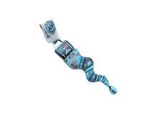 Load image into Gallery viewer, Turquoise and silver pendant shaped like a snake with a Navajo deity head on a white background