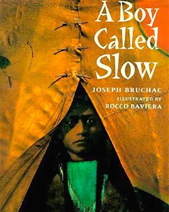 Cover of the book 'A Boy Called Slow' by Joseph Bruchac with illustrations by Rocco Baviera, featuring a young person peeking out from behind a tear in a blanket.