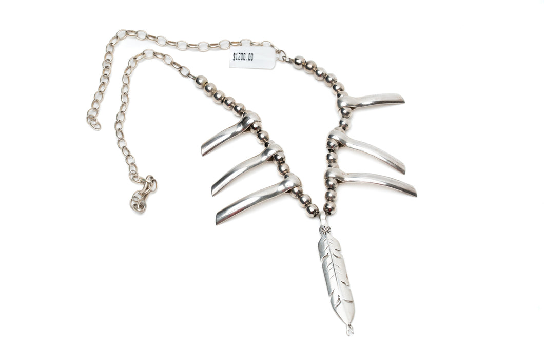 Tribal Inspired Necklace With a Feather Pendant