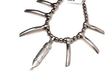 Tribal Inspired Necklace With a Feather Pendant