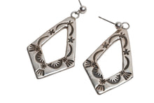 Load image into Gallery viewer, Pair of silver earrings with intricate designs on a white background
