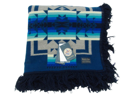 Pendleton Chief Joseph Blanket in Aegean featuring a traditional Native American-inspired geometric pattern with arrow motifs, folded neatly to show intricate design and soft wool texture. front View 