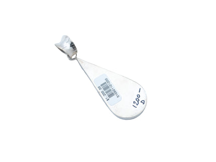 Teardrop-shaped silver pendant with barcode and price written on the back, Back View of pendant placed on a white backraound.