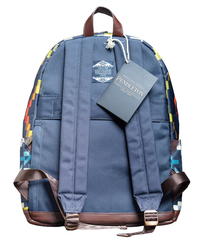 Back view of backpack with which is blue and has blue and brown straps