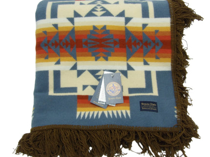 Pendleton Chief Joseph Blanket in Shale featuring a traditional Native American-inspired geometric pattern with arrow motifs, folded neatly to show intricate design and soft wool texture. front View 