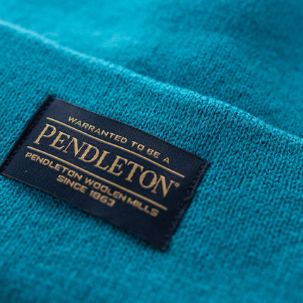 Close-up of Pendleton tag on teal beanie