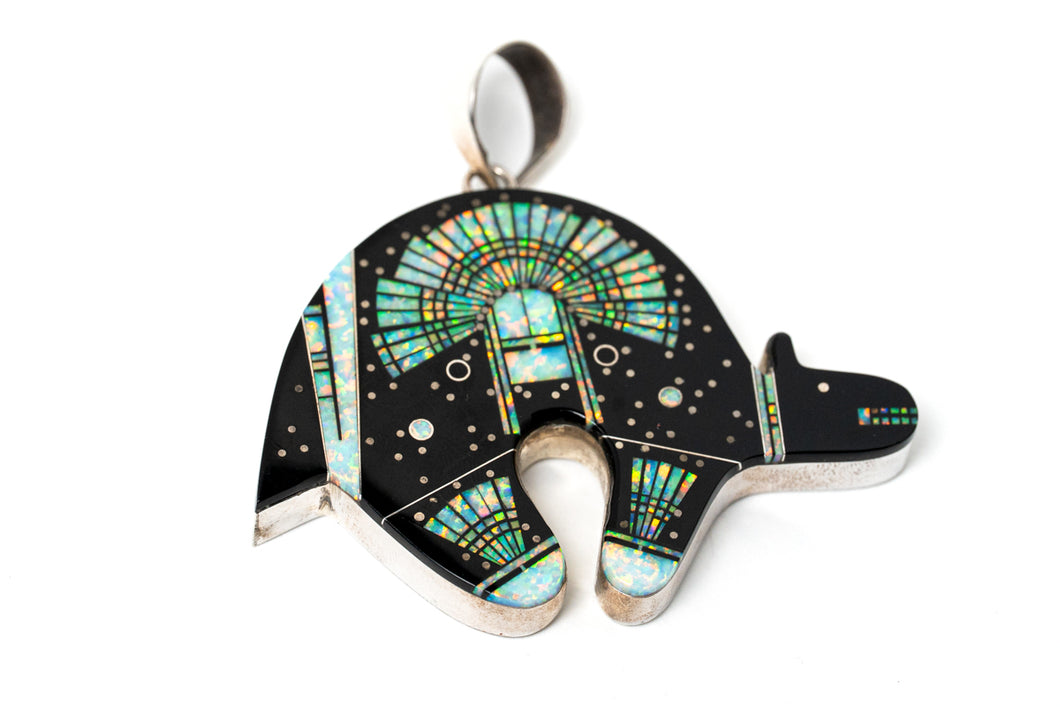 Jet black bear shaped inlay Navajo pendant with a Yei on the surface in opal