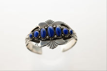 Load image into Gallery viewer, Silver stamped bracelet with lapis stones on a white background
