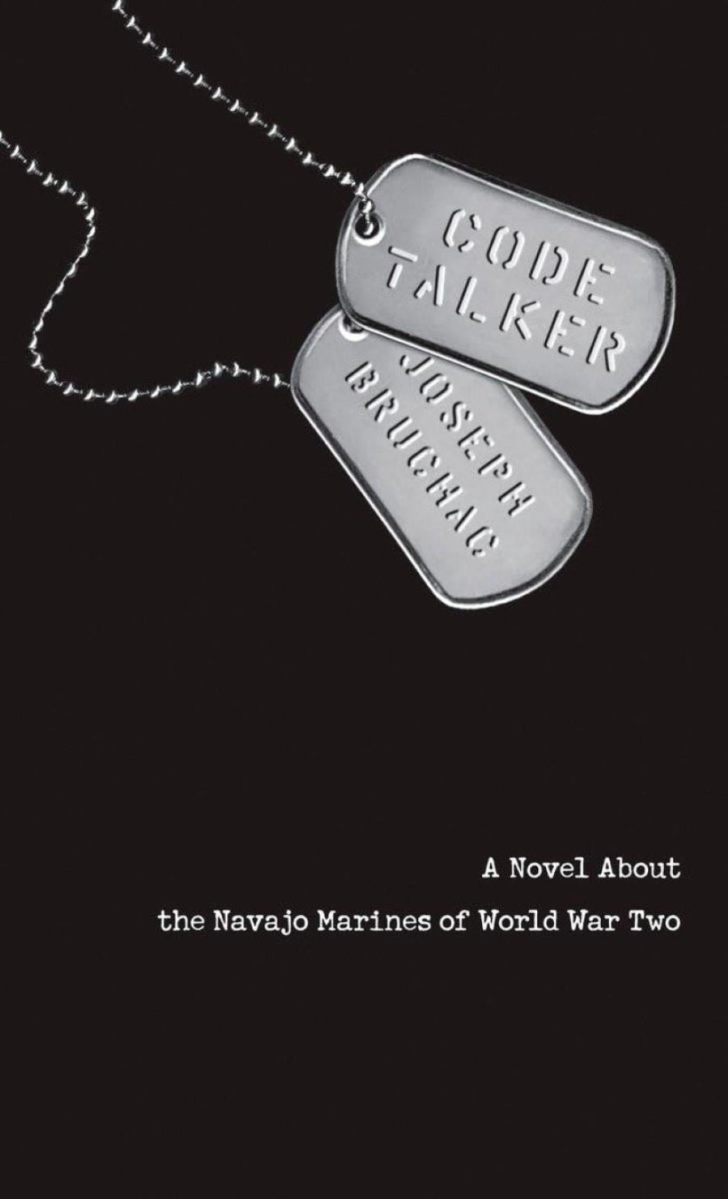 Book cover of 'Code Talker: A Novel About the Navajo Marines of World War Two' depicting two silver-colored metal neck grommets with the text 'CODE TALKER JOSEPH BRUCHAC'.