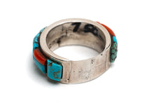 Load image into Gallery viewer, Bottom of silver ring with turquoise and coral inlay on a white background
