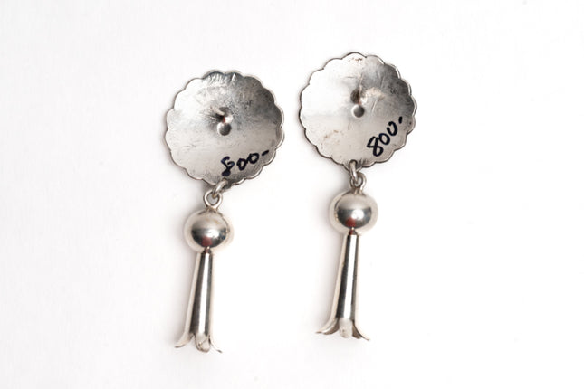 Pair of silver earrings with '800' engraving on a white background