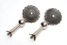 Load image into Gallery viewer, Pair of Native American silver earrings with floral designs on a white background
