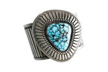 Load image into Gallery viewer, Navajo Silver bracelet with a Kingman turquoise gemstone on a white
