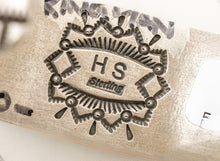 Load image into Gallery viewer, Close-up of a silver artist stamp with &#39;HS Sterling&#39; engraving on a white background
