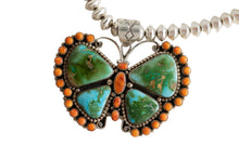 Load image into Gallery viewer, Butterfly-shaped pendant with turquoise stones and orange accents on a white background
