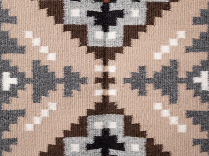 Hand-woven Navajo Rug with geometric pattern on a plain white background, center view