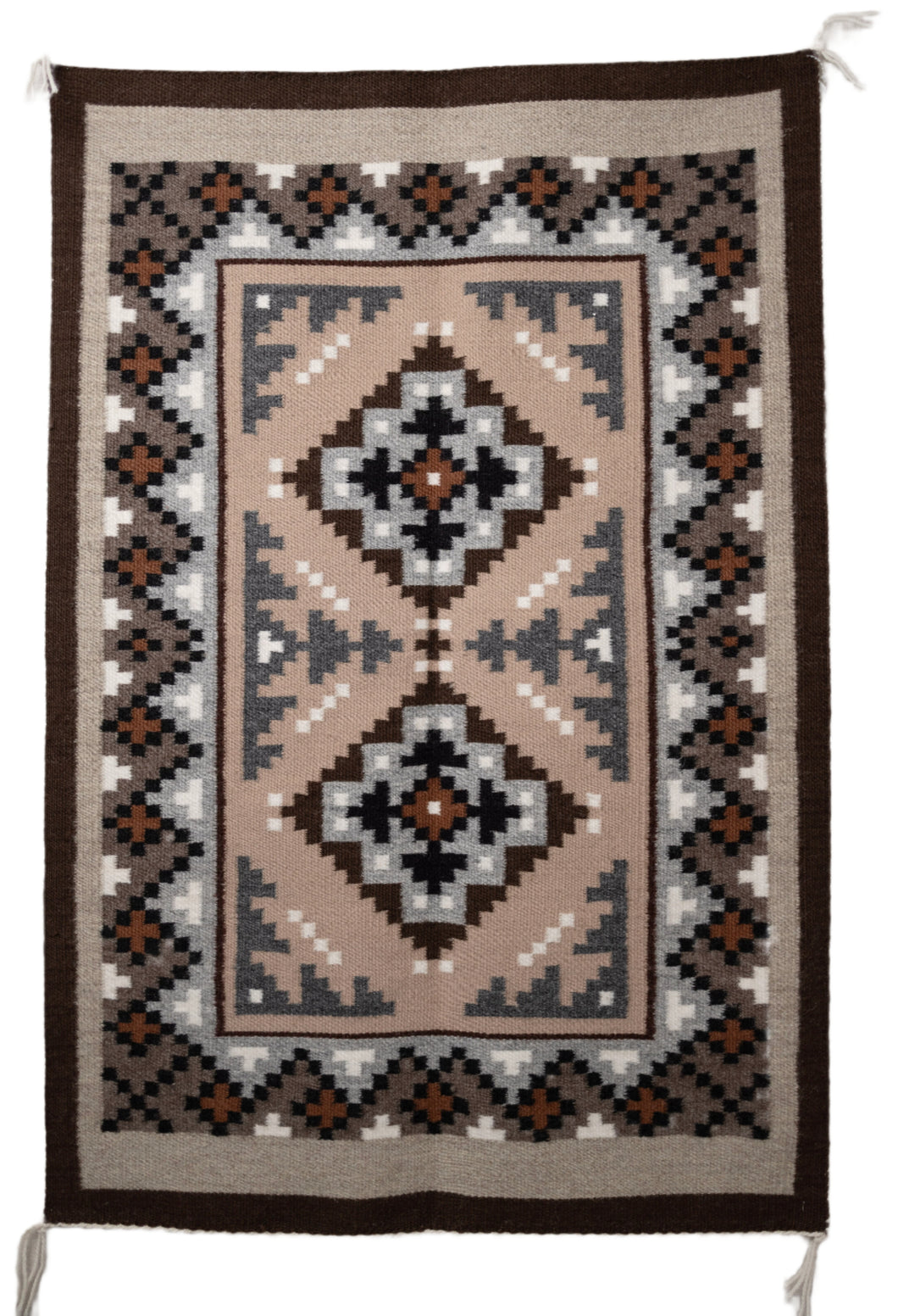 Hand-woven Navajo Rug with geometric pattern on a plain white background, flat view