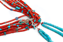 Load image into Gallery viewer, Close up view of a single Native American necklace with nine strands of Mediterranean coral with sleeping beauty, Royston and Kingman Turquoise stones, and Lapis on a white background

