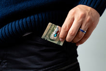 Load image into Gallery viewer, Hand with a blue ring holding a twenty dollar bill with a silver and turquoise money clip
