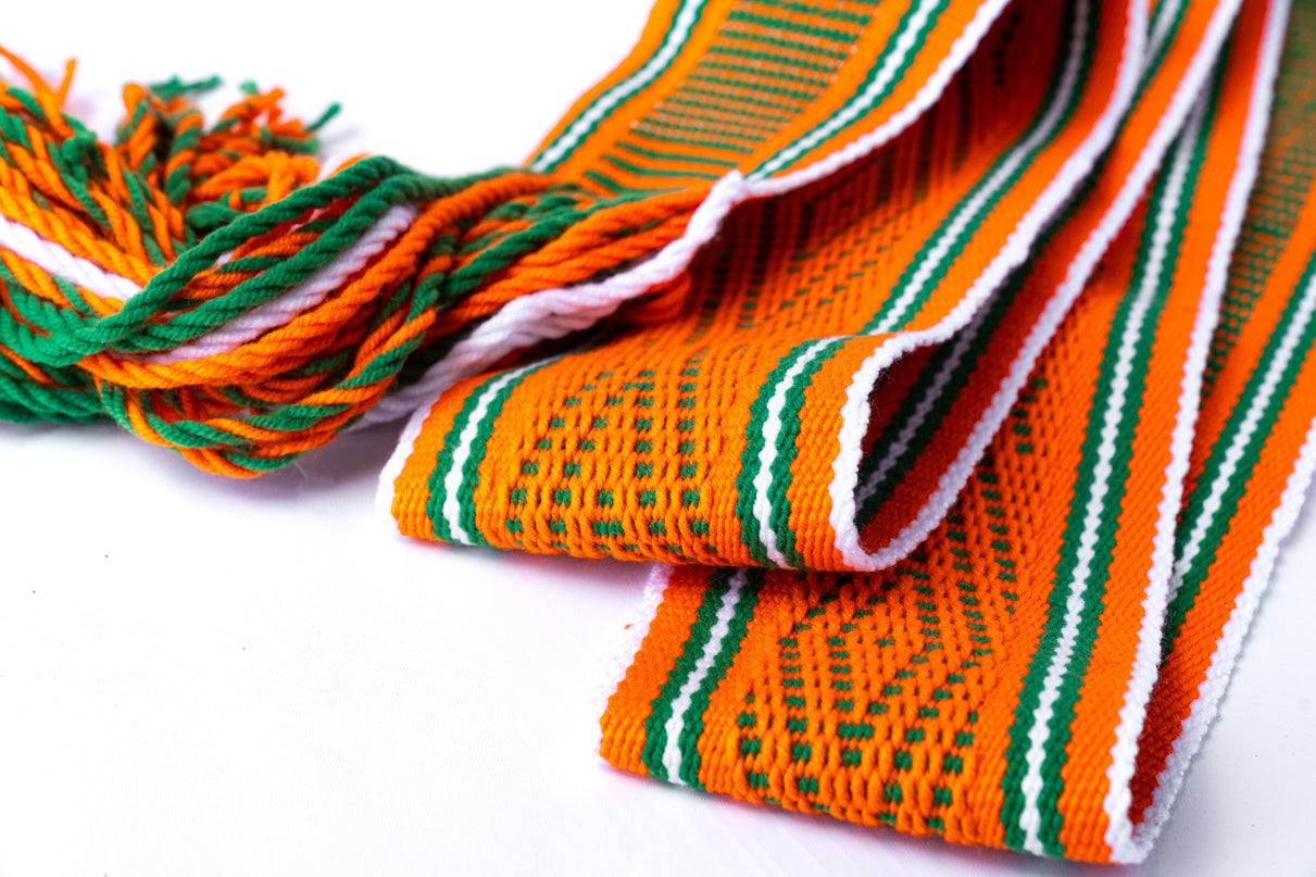 Navajo Sash Belt that is Orange with Green and White Stripes. Fold on itself