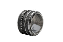 Load image into Gallery viewer, Navajo silver ring with textured rings design on a light gray background
