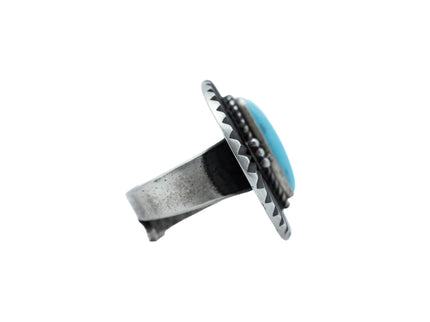 Ruffled Disc Ring with a Sleeping Beauty Turquoise By Navajo Silversmith Herman Smith