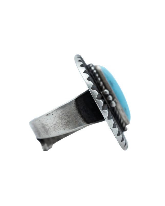 Ruffled Disc Ring with a Sleeping Beauty Turquoise By Navajo Silversmith Herman Smith