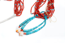 Load image into Gallery viewer, Turquoise and coral beaded necklace on a white background
