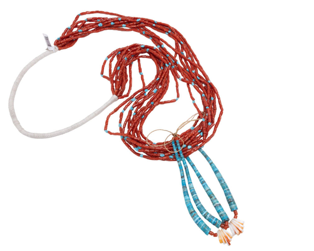 Navajo Coral Jacloo necklace with a white cord on a white background