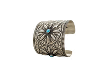 Load image into Gallery viewer, Herman Smith sterling silver cuff with three Beauty turquoise gemstones and hand-stamped patterns sitting upright on a white background

