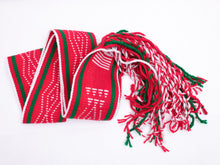 Load image into Gallery viewer, Red and white traditional sash with two green lines folded in a v shape line on a white background
