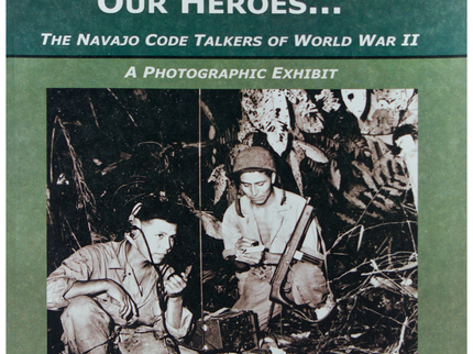 Cover of a photographic exhibit book titled 'OUR FATHERS, OUR GRANDFATHERS, OUR HEROES. A black and white photograph of two Code Talkers on a radio during WWII
