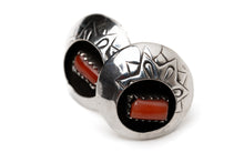 Load image into Gallery viewer, Pair of circular silver and coral shadow box stud earrings leaning against each other on a white background
