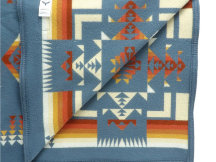Pendleton Chief Joseph Blanket in Shale featuring a traditional Native American-inspired geometric pattern with arrow motifs, folded neatly to show intricate design and soft wool texture, Inside view
