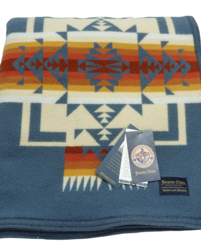 Pendleton Chief Joseph Blanket in Shale featuring a traditional Native American-inspired geometric pattern with arrow motifs, folded neatly to show intricate design and soft wool texture. front View 