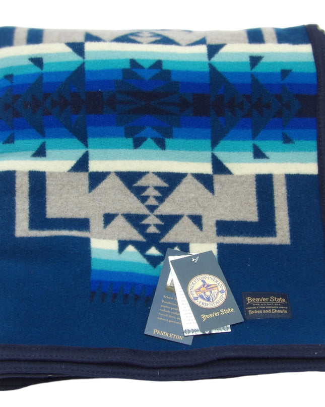 Pendleton Chief Joseph Blanket in Aegean featuring a traditional Native American-inspired geometric pattern with arrow motifs, folded neatly to show intricate design and soft wool texture. front View 
