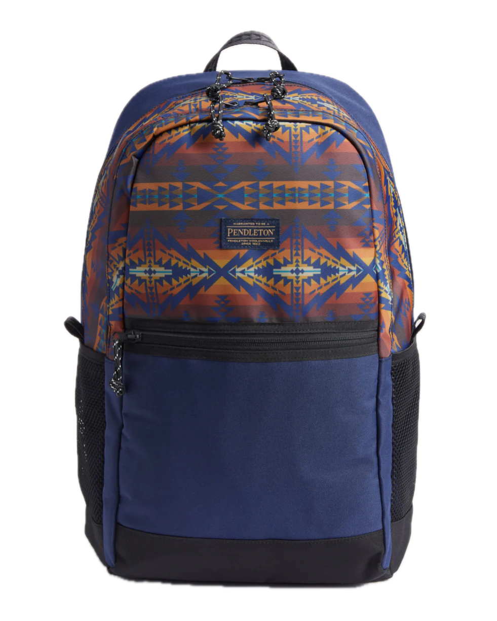A navy-colored Pendleton Trapper Peak backpack with a geometric pattern in blue and orange on the side.