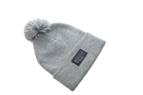 Pendleton grey beanie with pom-pom top on a white background