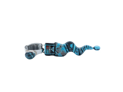 Turquoise and silver pendant shaped like a snake with a native motif head on a white background