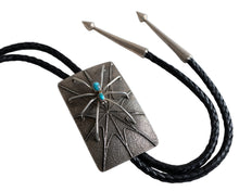 Load image into Gallery viewer, Silver Bolo tie with decorative pendant featuring a raised spider design and turquoise stone on a white background
