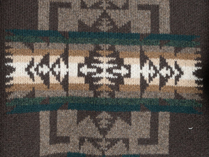 Closeup of Chief Joseph pattern on a brown pullover sweater