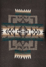 Load image into Gallery viewer, Closeup of Chief Joseph pattern on a brown pullover sweater
